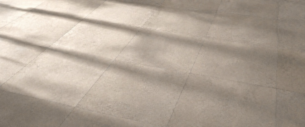 SPC vloertegels met betonlook in een afgewerkte ruimte